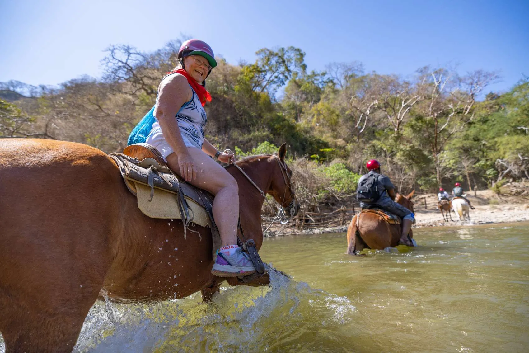 Horseback Riding in Puerto Vallarta Best 5-Hour Day Trip 1 Riders crossing the Mascota River on a guided horseback tour